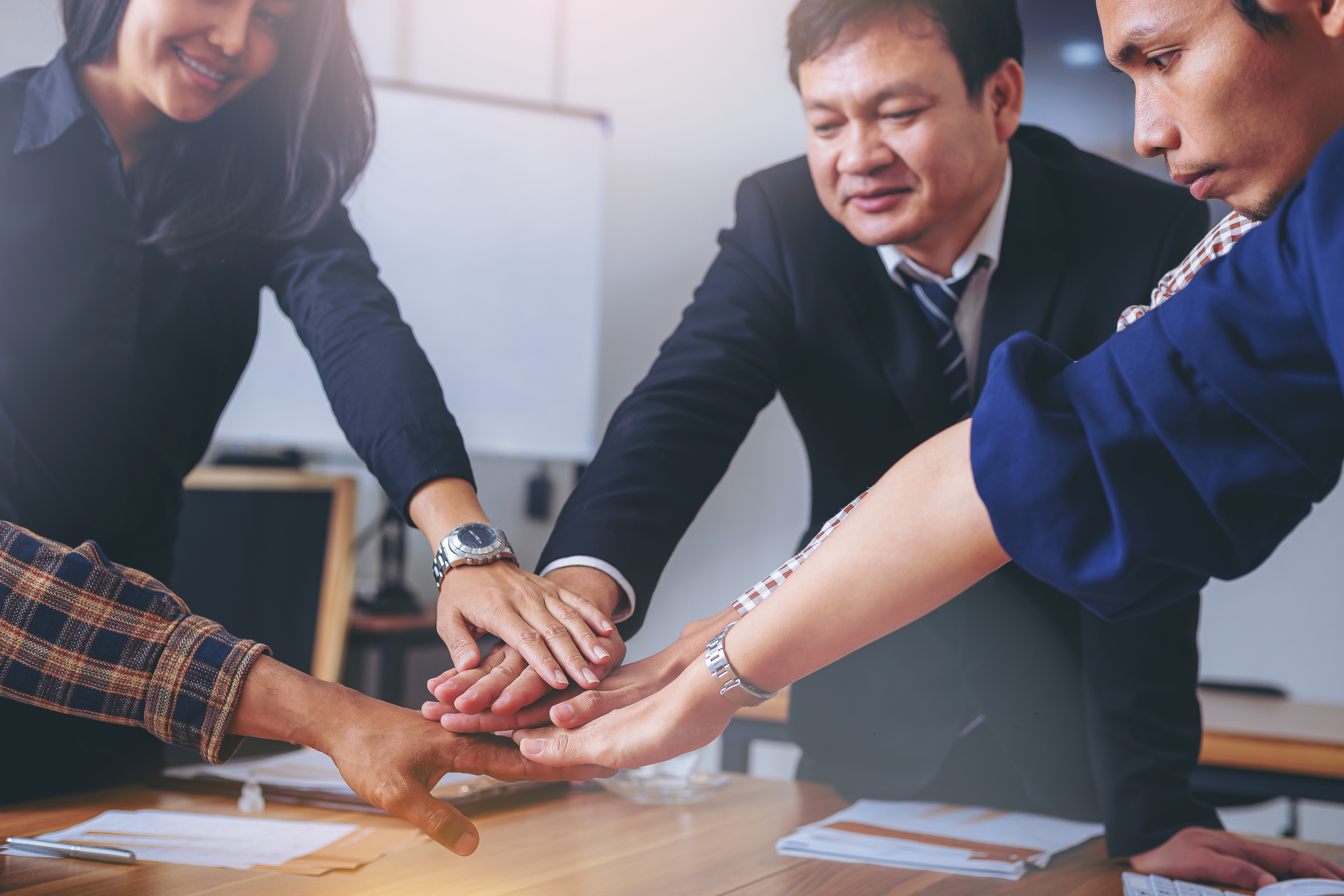 group-business-people-join-hands-office-teamwork-together-concept-selected-focus
